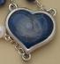 Back of center for Lourdes water Rosary gift set.