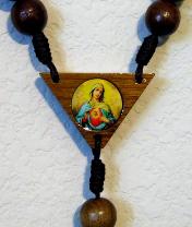 Immaculate Heart of Mary wood wall rosary center