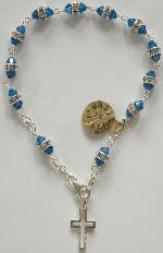 Sterling Silver Swarovski Crystal Rosary Bracelet with blue swarovski crystal cap beads